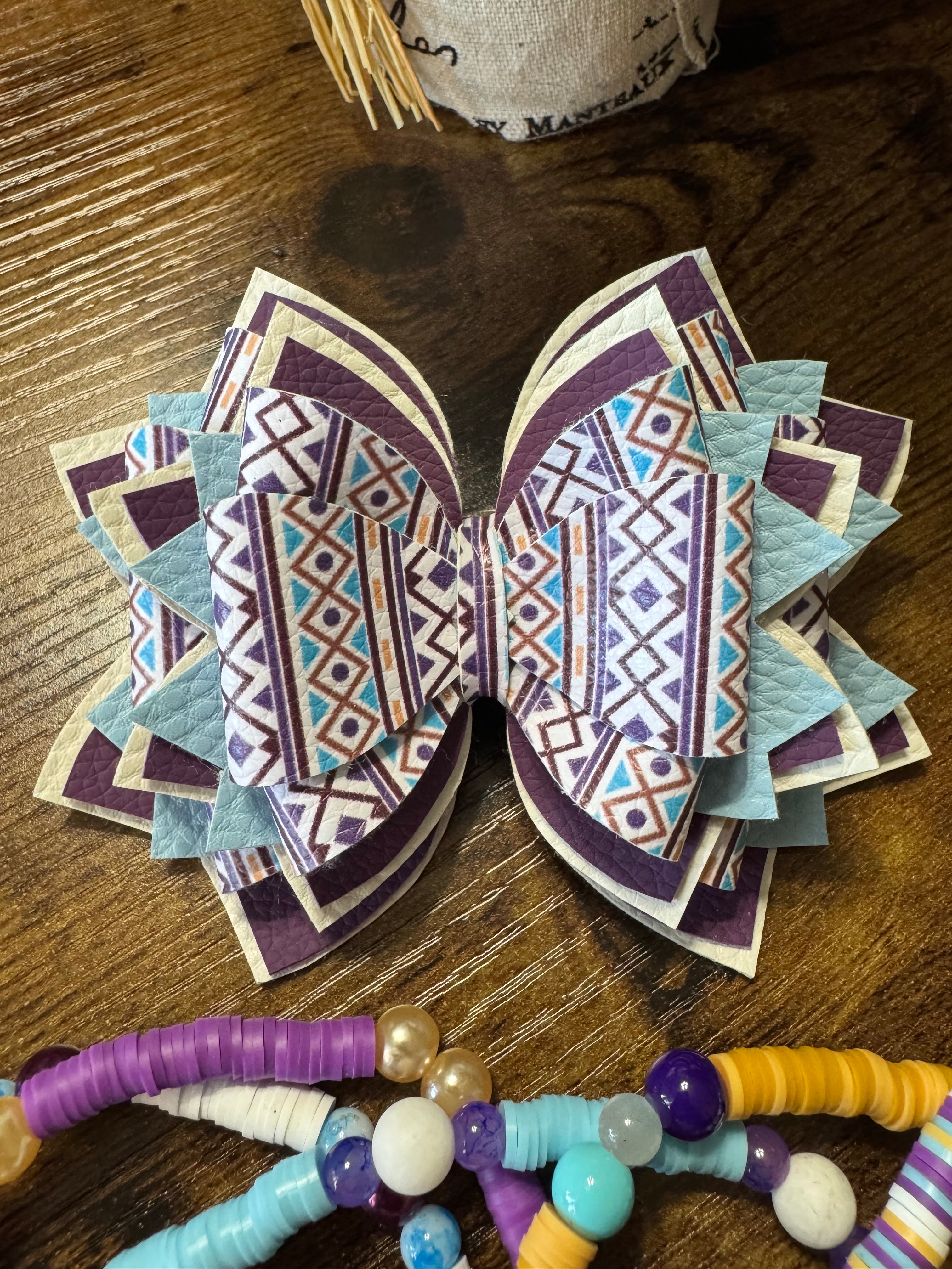 Little blue, purple, white patterned Stanley, Tumbler Bow and boot bracelet set